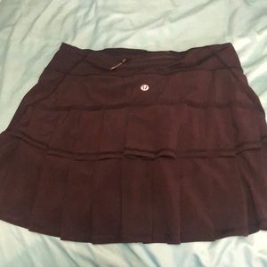 Black pair of skorts brand new with zipper on pocket